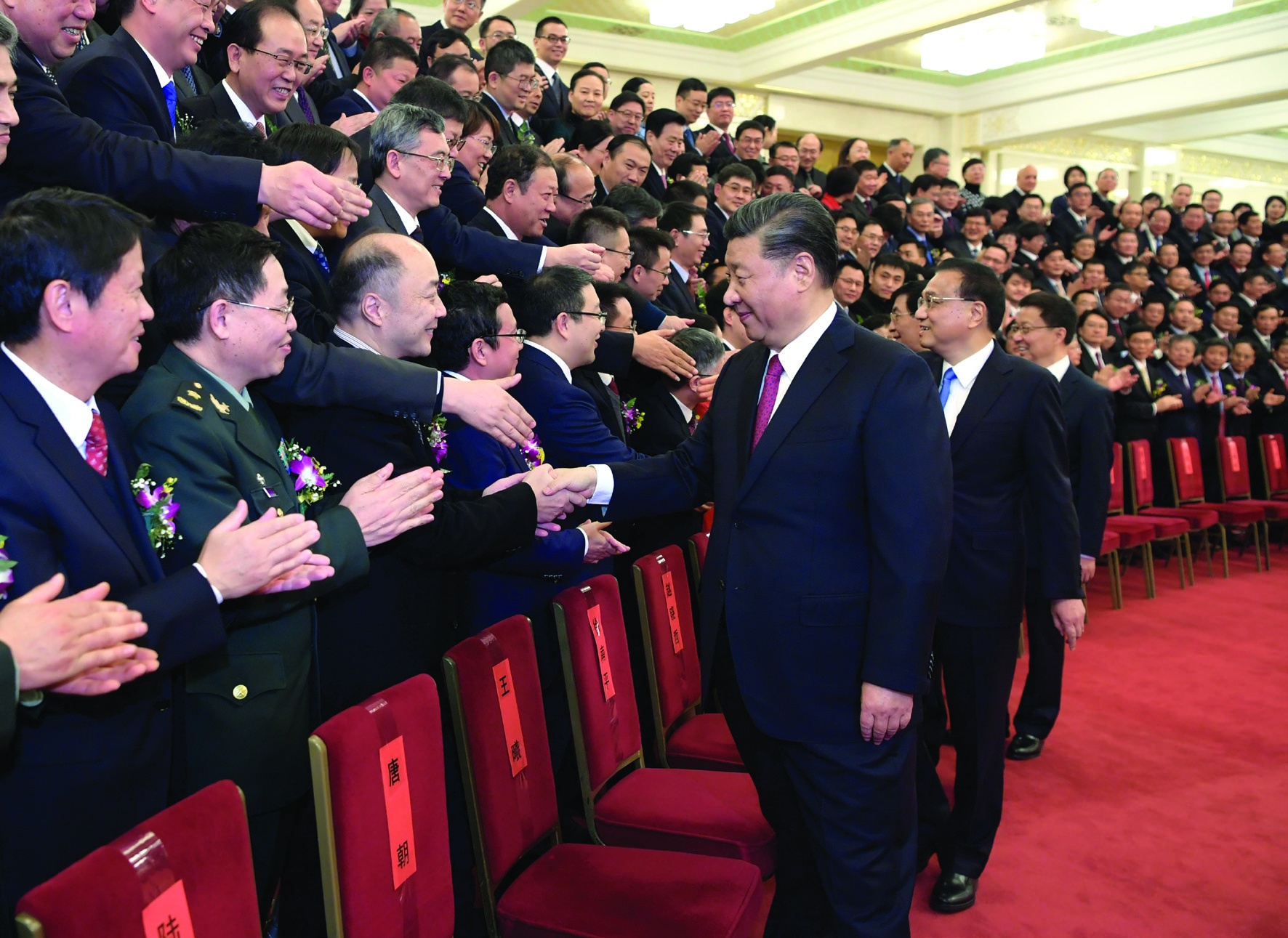 Chinese President Xi Jinping meet with representatives of the award winners before an annual ceremony to honor distinguished scientists, engineers and research achievements at the Great Hall of the People in Beijing, capital of China, Jan. 10, 2020. (Li Xueren/Xinhua)