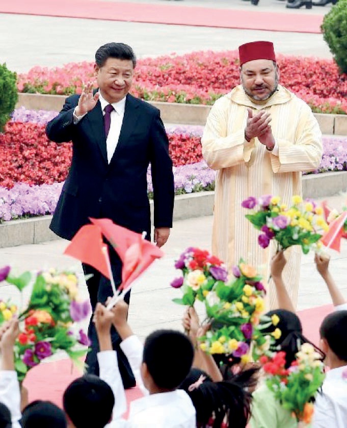 President Xi Jinping (L) holds a welcoming cere- mony for King Mohammed VI of Morocco, Beijing, May 11, 2016. (Xinhua, 2016)
