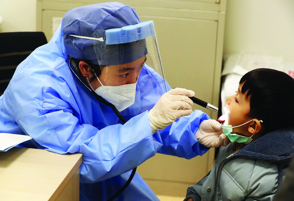 To protect the lives and health of 7 billion people around the world, the international community should establish a more complete global public health governance system to respond to various long-term or sudden global public health conditions. (Zhu Xingxin/China Daily)