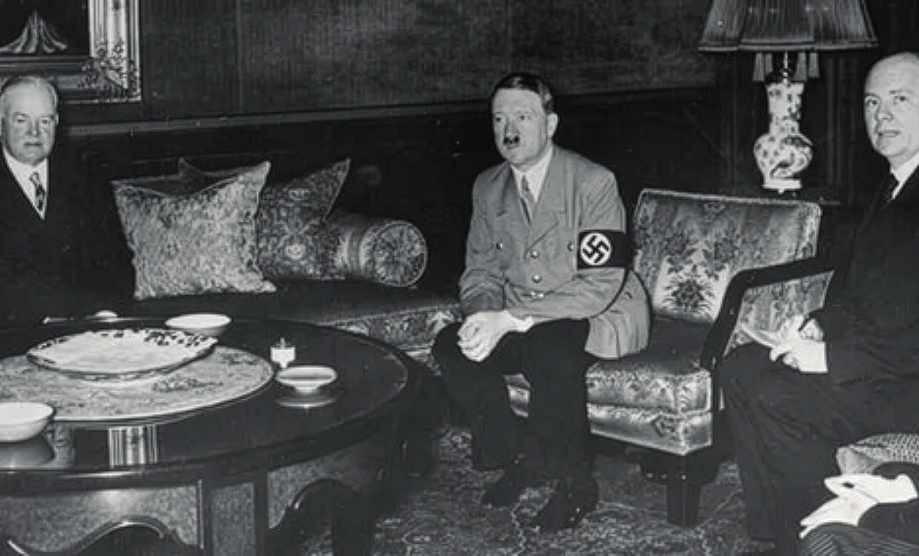 Former President Hoover at the Reich Chancellery with Chancellor Adolf Hitler and Hugh Wilson, March 8, 1938 (Photo: National Archives, 2017).