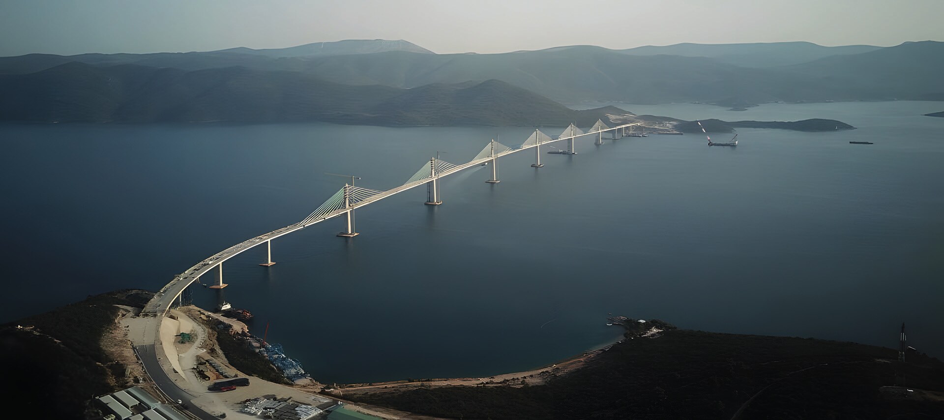 Photo taken on July 29, 2021 shows the Peljesac Bridge being built by China as part of the Belt and Road Initiative in Mali Ston Bay near Komarna in southern Croatia. The 2.4 km bridge over Mali Ston Bay in the Adriatic Sea connects mainland Croatia and the Peljesac Peninsula of the southernmost Dubrovnik-Neretva County, bypassing a short strip of Bosnia and Herzegovina territory (Photo: Xinhua/Gao Lei, 2021).